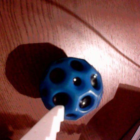 Real gripper camera over the blue ball